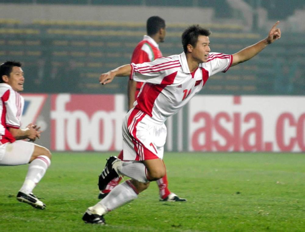 中國男足征戰(zhàn)世界杯歷史_2001年中國男足世界杯首次出線_米盧蒂諾維奇上海紀(jì)念活動